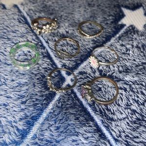 7 Assorted Silver/Clear Rings